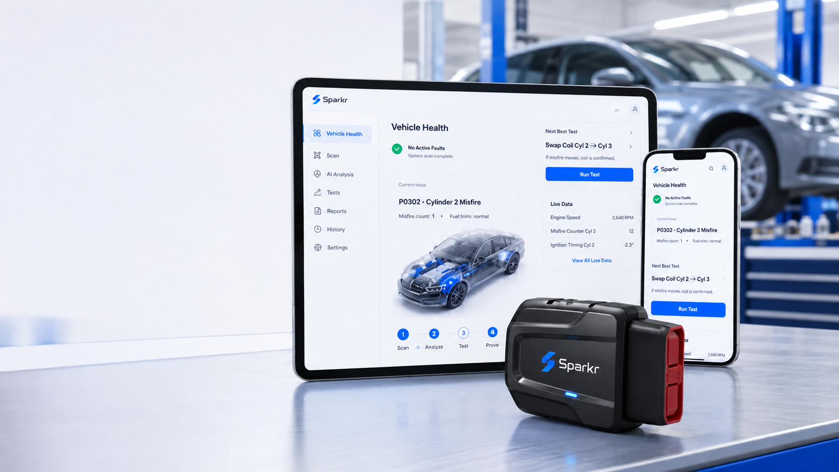 Sparkr Link plugged in beside a tablet and phone showing the Sparkr diagnostic workspace on a 2018 Camry in a repair bay